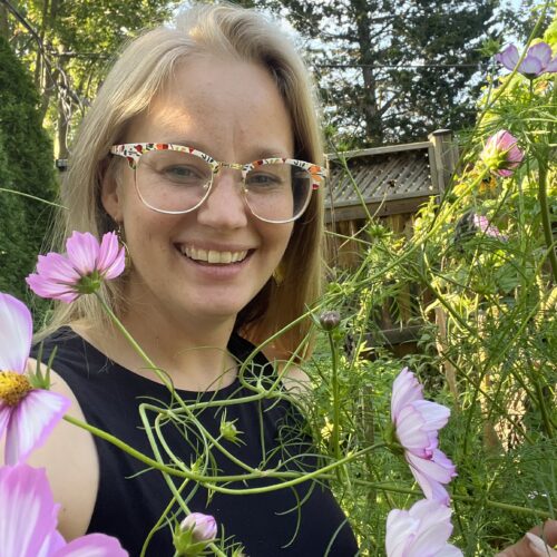 photo of Rebecca with pink flowers